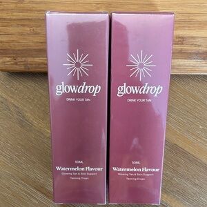 Glow drops!   Drink your tan.  Two bottles Unopened.